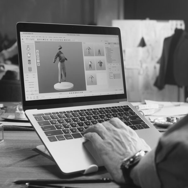 Uomo creativo che lavora alla creazione digitale di un modello digitale al computer